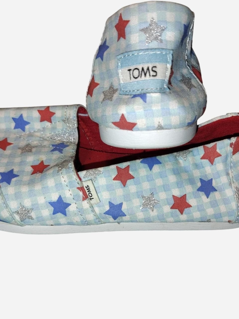Toms Women's Star-Print Slip-Ons in Light Blue with Red, Blue & Silver Stars